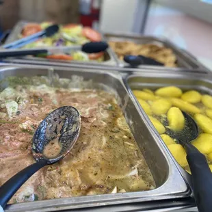 a variety of food items in a buffet