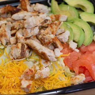 chicken, avocado, tomatoes, and cheese