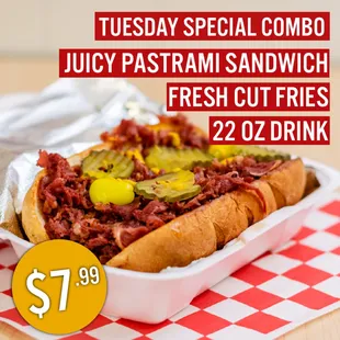 a hot dog with pickles and pickles