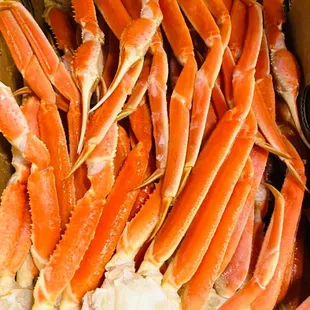 a large pile of crab legs