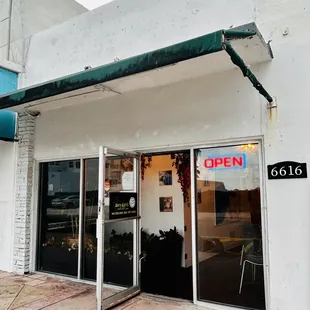 the front entrance of a restaurant