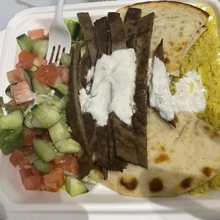 Sad salad, barely any meat and RICE?!?! Who has rice in a Gyro platter?!?!