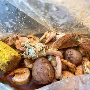 Monday special of headless shrimp, snow crab legs, corn and potatoes