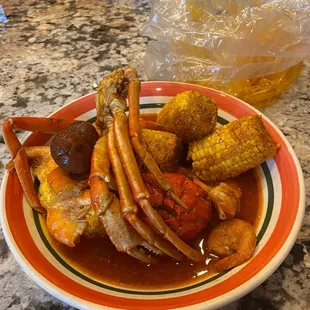 Red Bomb, crab, lobster, shrimp, potatoes &amp; corn galore
