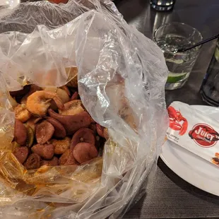 Shrimp scallops sausage corn potatoes boil