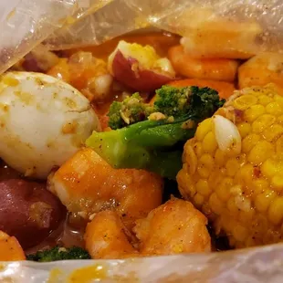 Seafood boil Medium with garlic butter added Broccoli and Boil Eggs