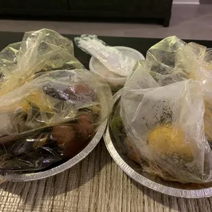 a variety of foods wrapped in plastic