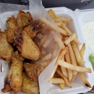 fries in a styrofoam container