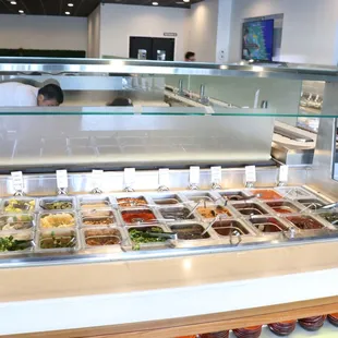 a buffet with a variety of food items