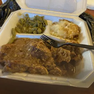 Smothered covered pork chops! Soooo good!