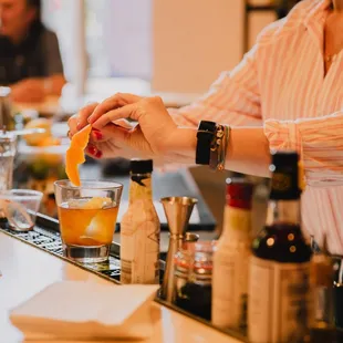 a bartender preparing a cocktail