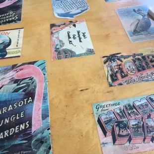 arious posters on a table