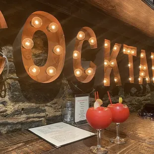 two cocktails on the bar counter
