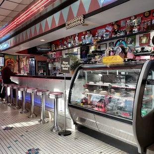 the interior of a juke box diner