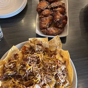 Salted Carmel wings and a special of the day pulled pork nachos