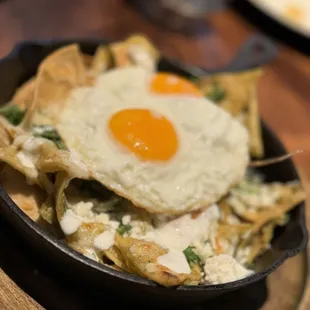 Chilaquiles ~ excellent!! Spicy but delicious