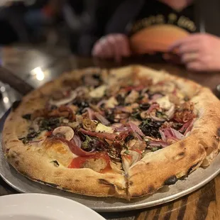 Carnivora pizza with mushroom and olives