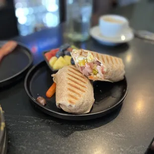 Rise &amp; Shine Wrap with ham, bell peppers, Kalamata olives, and feta.