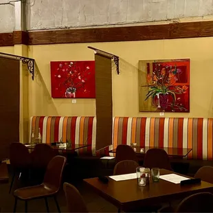 One side of the dining room interior. The partitions can be raised for larger parties.