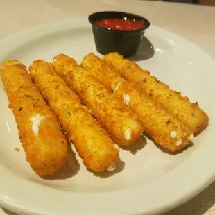 a plate of deep fried fish sticks