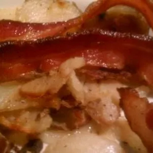 bacon and potatoes on a plate