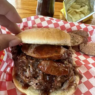 Chopped Brisket sandwich w/ jalapeño sausage
