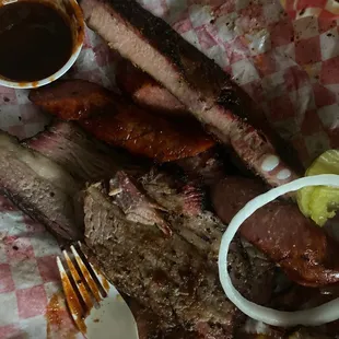 a plate of ribs and sides