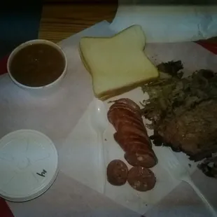My Plate with the Brisket, Beans, Bread and Sausage.