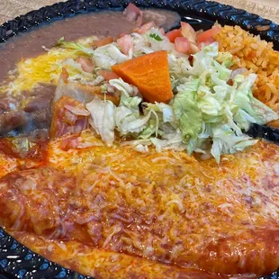 Cheese enchiladas, rice and beans.