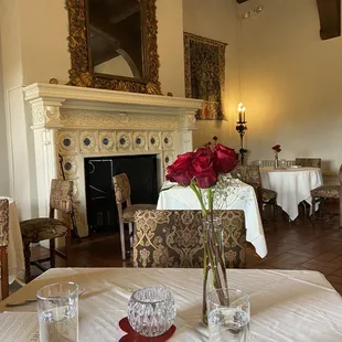 a dining room with a fireplace