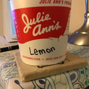 a cup of lemon ice cream