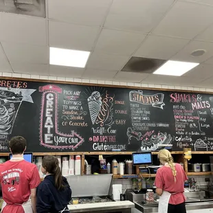 a chalkboard with a variety of menus