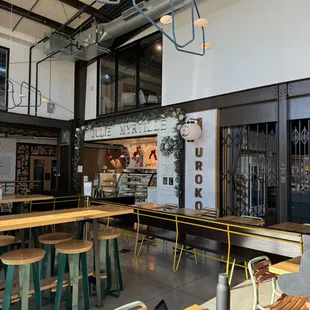 a man sitting at a table with a laptop