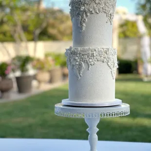 a wedding cake on a cake stand