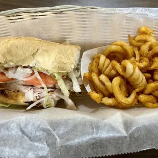 1/2 Wild Turkey Po-Boy, with a side of Curly Qs.