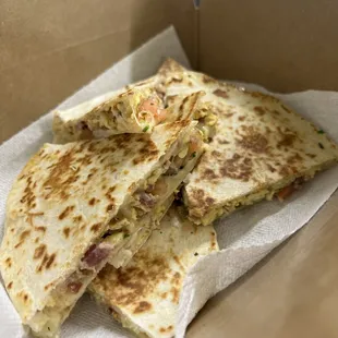 Breakfast quesadilla - bacon, scrambled eggs, cheese, pico de gallo / side of sour cream