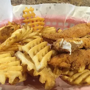 Chicken strips and Waffle fries.