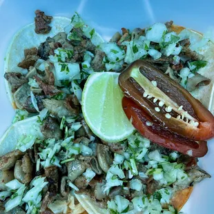 a plate of tacos