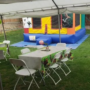 Tables, chairs, tent, jumper