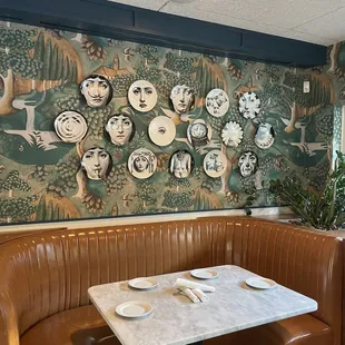 a wall of plates on the wall
