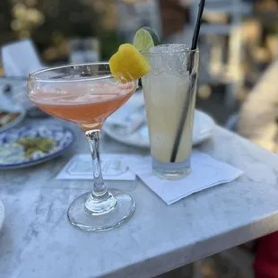 two cocktails on a table