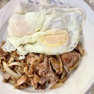 Fried adobo with over easy eggs.So good!!Never ate adobo like this!..