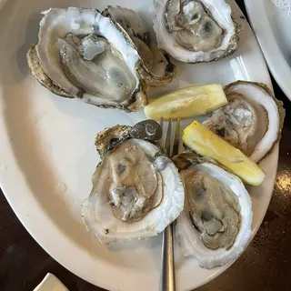 Raw or Steamed Oysters on the Half Shell*