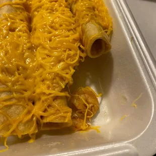 3 Rolled Tacos with Cheese