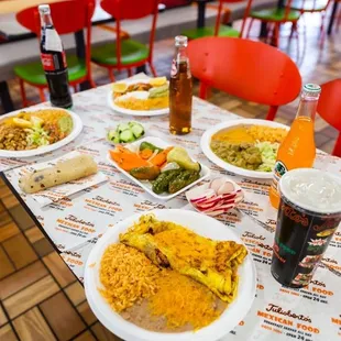 a table full of food and drinks