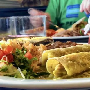 Chicken Enchilada Plate (tomatillo sauce) and top shelf Mexican Martini