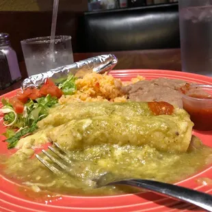 Chicken Enchilada Plate (w/ tomatillo sauce, of course!) and a bashful top-shelf margarita on the rocks. Soothes the soul!