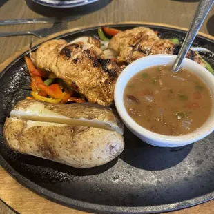 Fajitas with a baked potato and soup