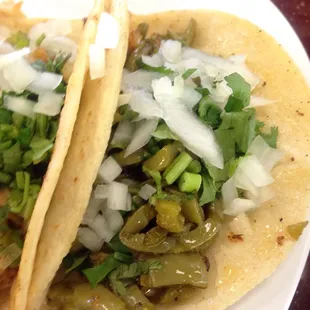 Nopales (cactus!) tacos. Vegetarian option. Better than most but need salsa to really make it flavorful.