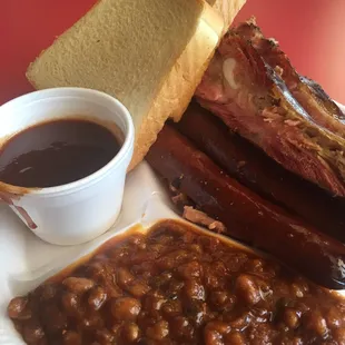 3 meat combo- ribs, hot link, brisket. Side- spicy baked beans